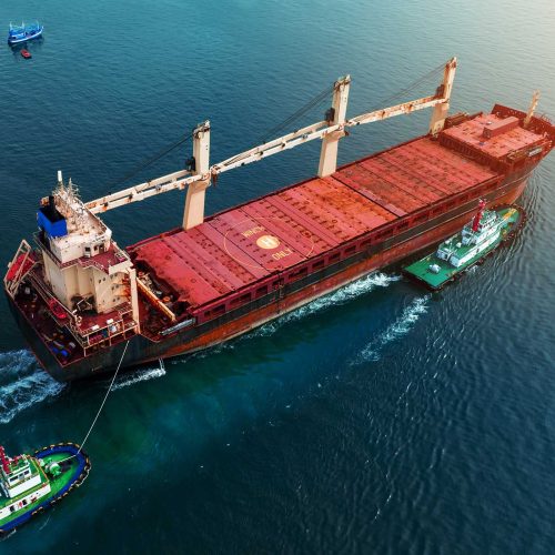 aerial-top-view-of-cargo-ship-carrying-container-a-7LUZK4G.jpg